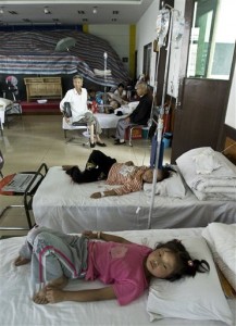 In this photo taken on Wednesday, Aug. 19, 2009, village children affected by lead poisoning from the Dongling Lead and Zinc Smelting Co. plant receive medical treatment at a hospital in Fengxiang county, west of Xi'an, China. More than 1,300 children have been sickened by lead poisoning in Hunan province, the second such case involving a large number of children this month, state media said Thursday. (AP Photo/Andy Wong)